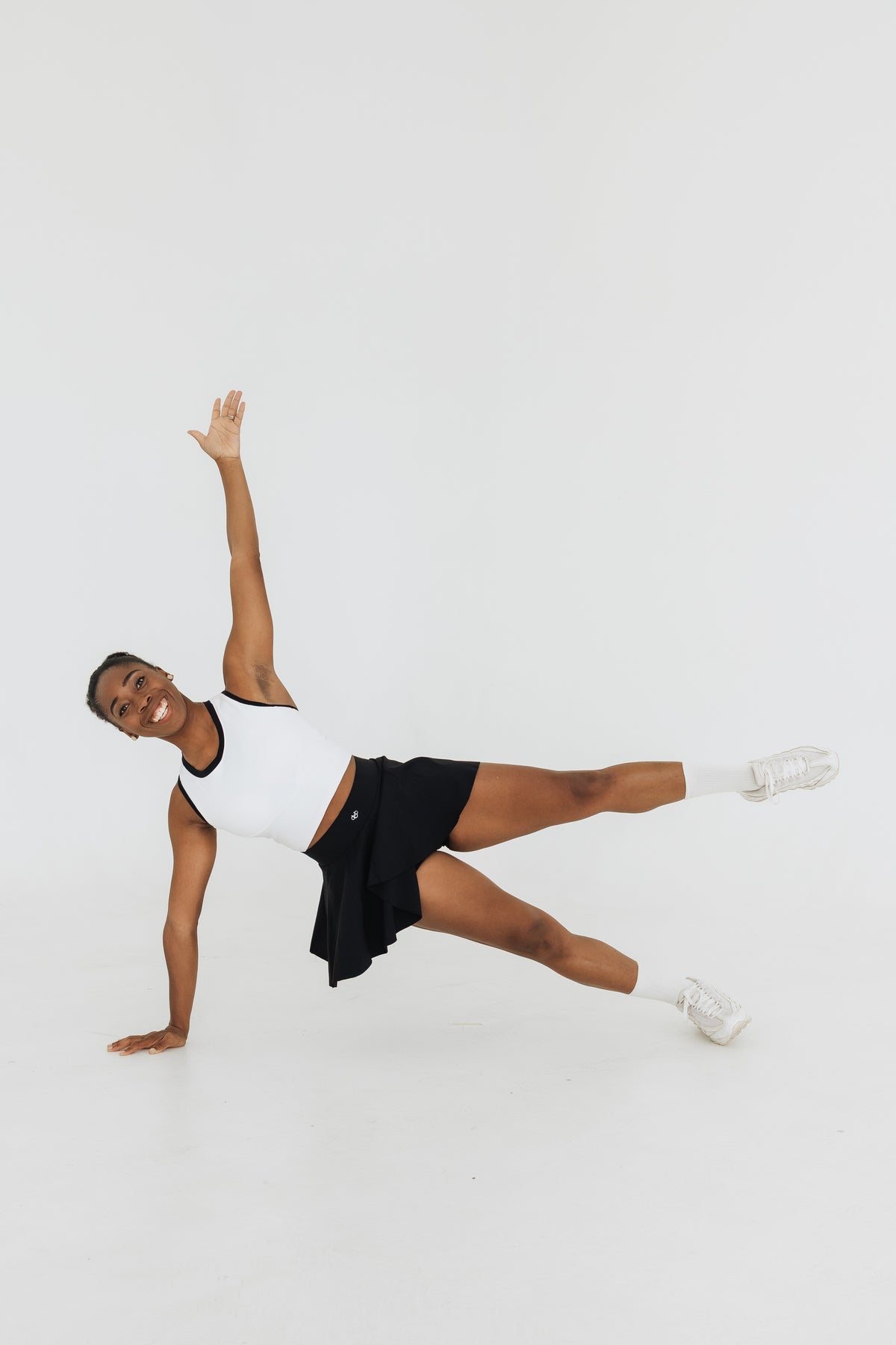 UNLMTD SWISH & SWAY SKIRT - UNLMTD Active + Lounge
